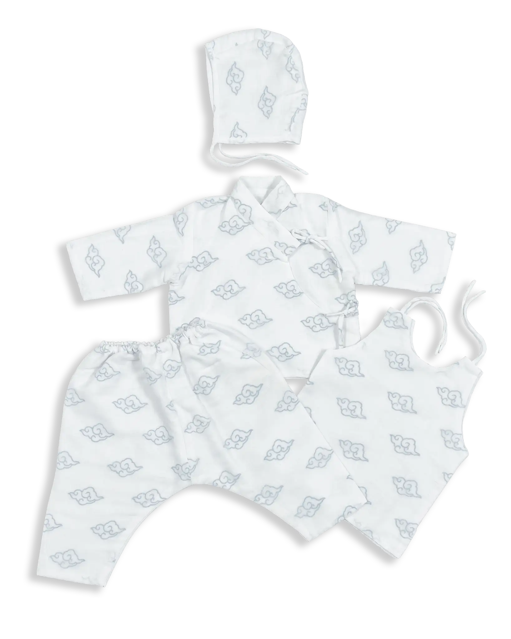 Traditional Nepali trousers, Bhoto, Overcoat and Hat in a centuries-old design called Daura Suruwal lined with breathable fine muslin to protect the baby from cold or heat.