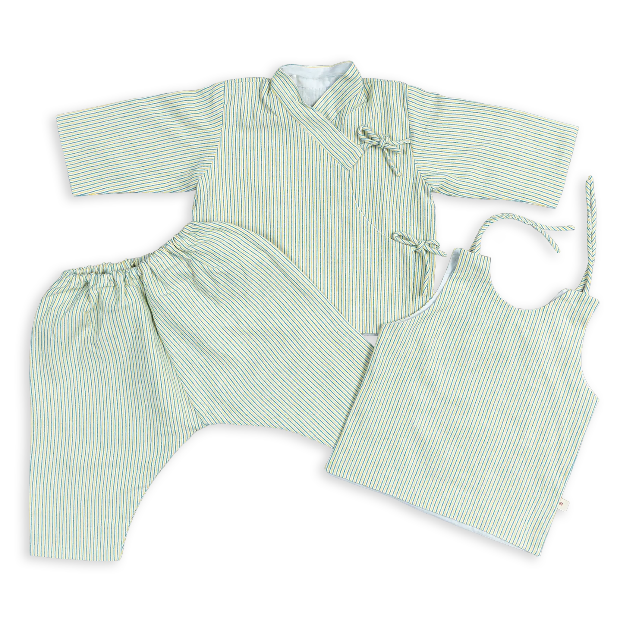 The traditional clothing combination the Nepali Trousers, Bhoto and Overcoat are based on a centuries-old design lined with fine muslin to protect the toddler from cold.