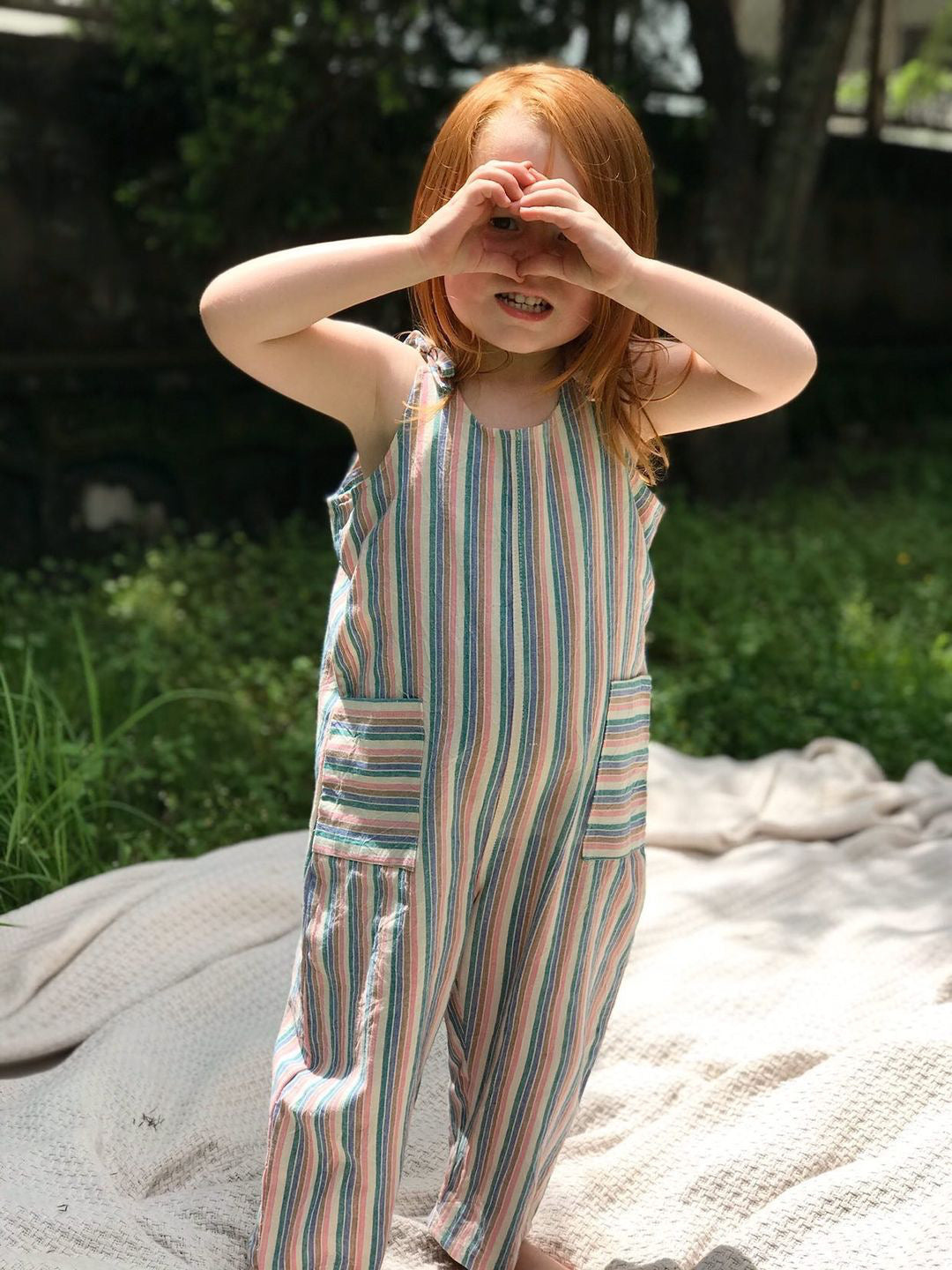Children love soft, breathable cotton clothes! These Dungarees are made from woven fabrics which are unisex, simple yet cool to wear this summer. Our textiles are woven by inmates here in Nepal that provide an opportunity to generate income and support families back home.